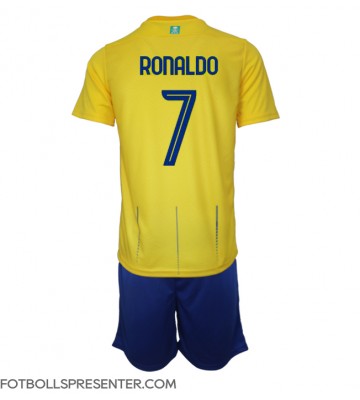 Al-Nassr Cristiano Ronaldo #7 Hemmatröja Barn 2023-24 Kortärmad (+ korta byxor)